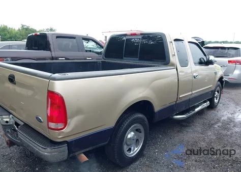 2000 Ford F150 из США, поврежденный, VIN 1FTRX17L0YNA64787